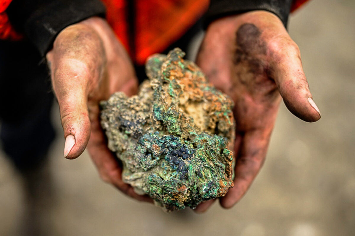 Oxidised copper ore held in two hands