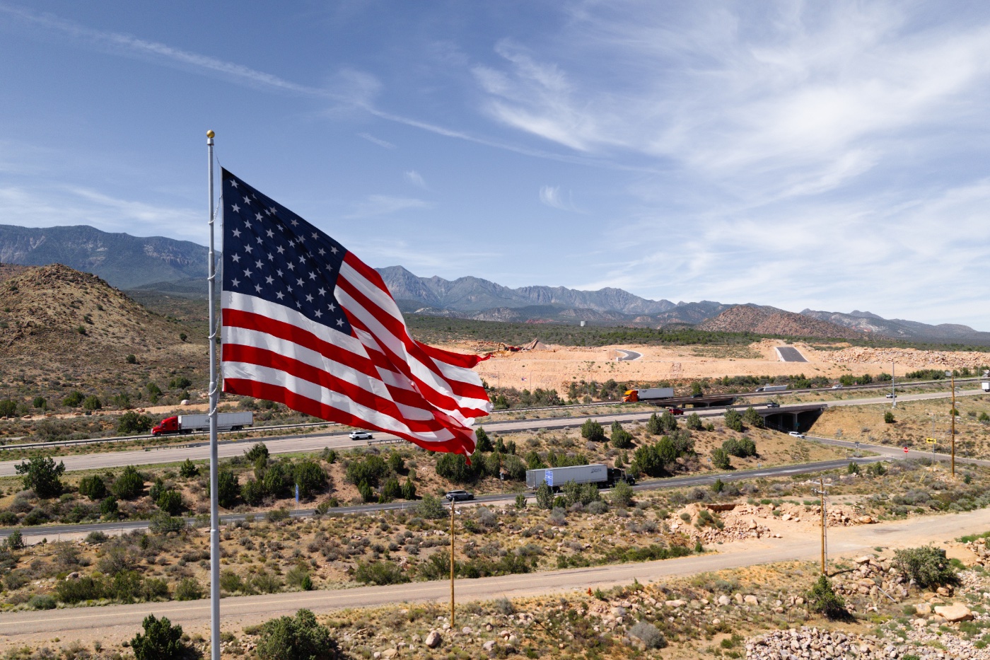 American flag flying over the field site